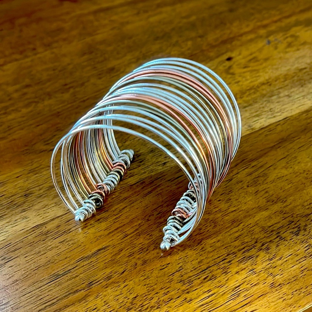 Silver, gold and bronze cuff bracket